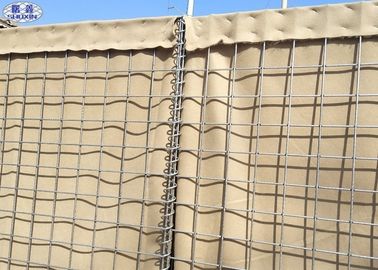 Στρατιωτικός Hesco διατηρώντας τοίχος εμποδίων προμαχώνων γεμισμένος άμμος για την προστασία